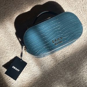 DKNY Octavia Oval Camera in the color Tea